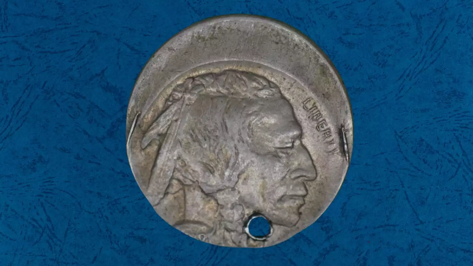 1918 Buffalo nickel off-center strike showing partial design and blank planchet crescent with date still visible